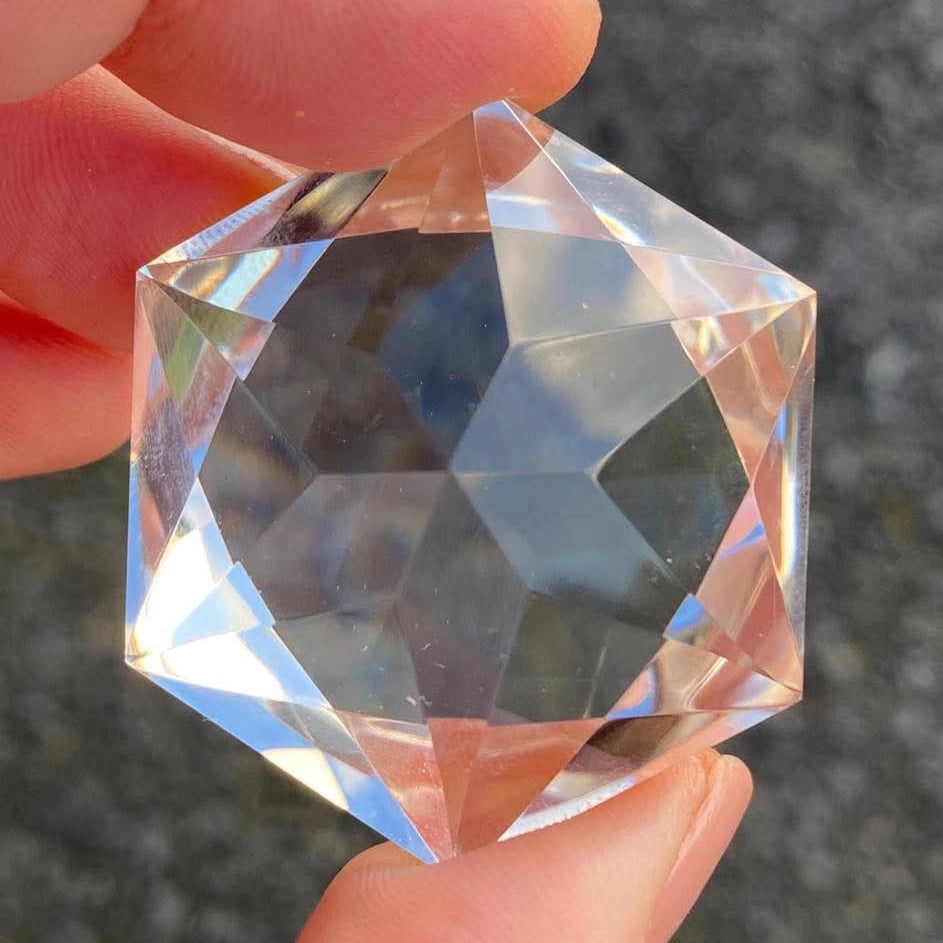 200 carat flawless brazilian clear quartz star cut gem, showcasing its sacred geometry and elite clarity - clearquartzshop