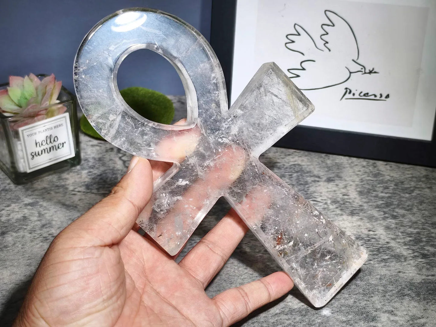 close-up of the 2500ct clear quartz ankh cross, showing intricate hand-carved details - clearquartzshop