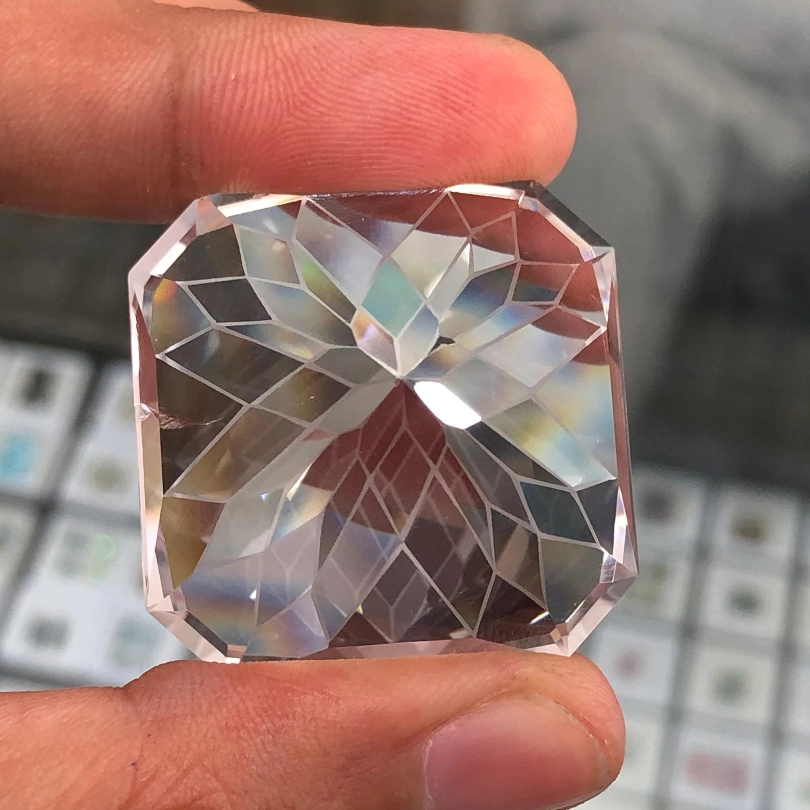 back view of the 185 carat flawless pakistani clear quartz faceted flower fantasy cut gemstone - clearquartzshop