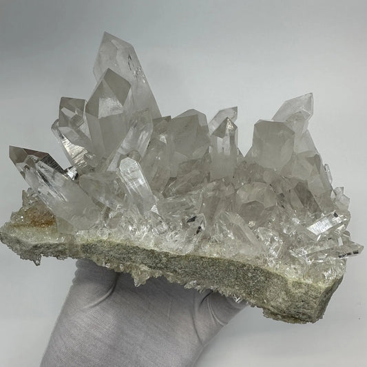 arkansas clear quartz cluster 2720g with sharp crystal points on natural matrix base, hand held - clearquartzshop
