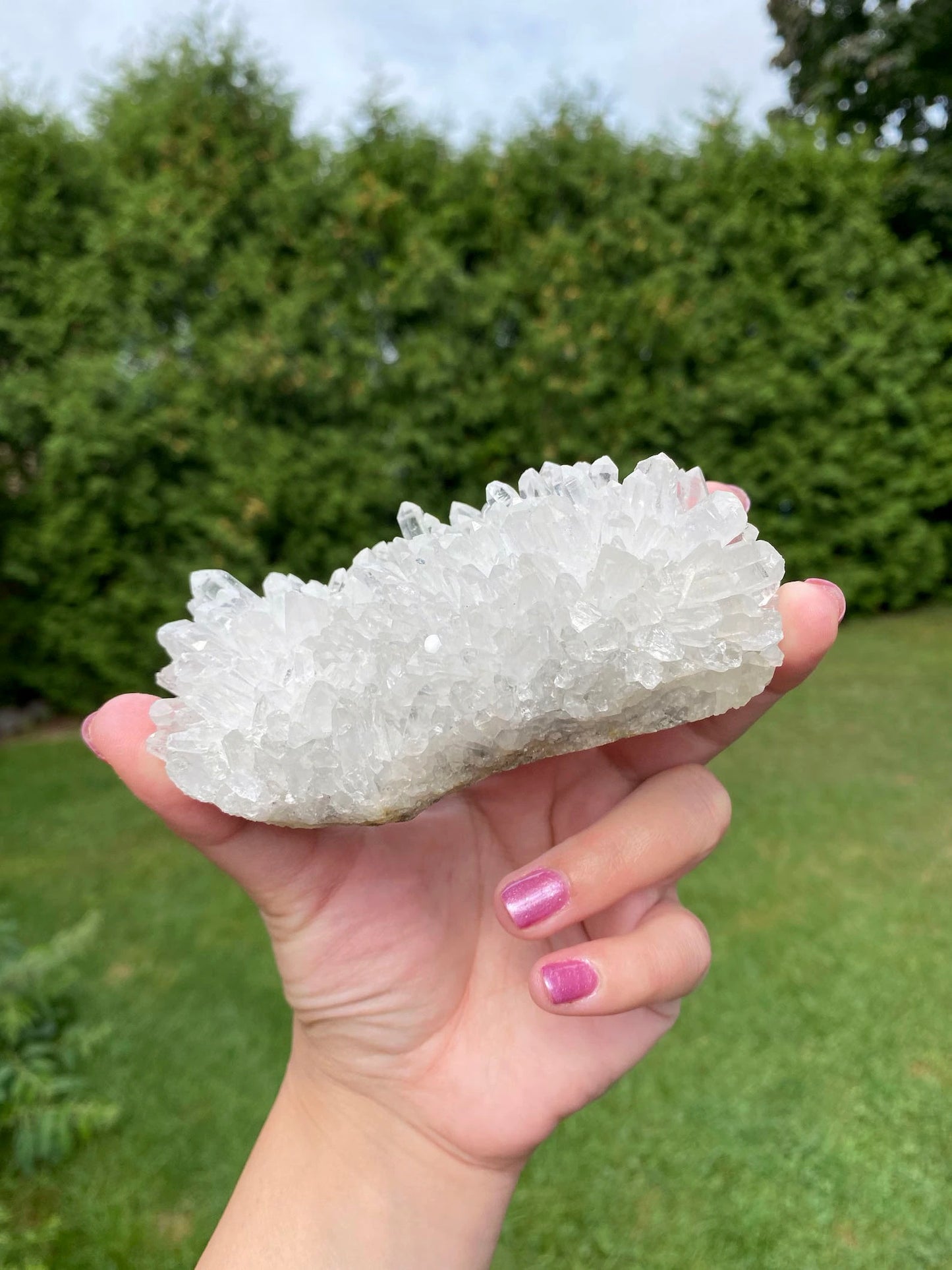 side view of raw clear quartz cluster from brazil - clearquartzshop