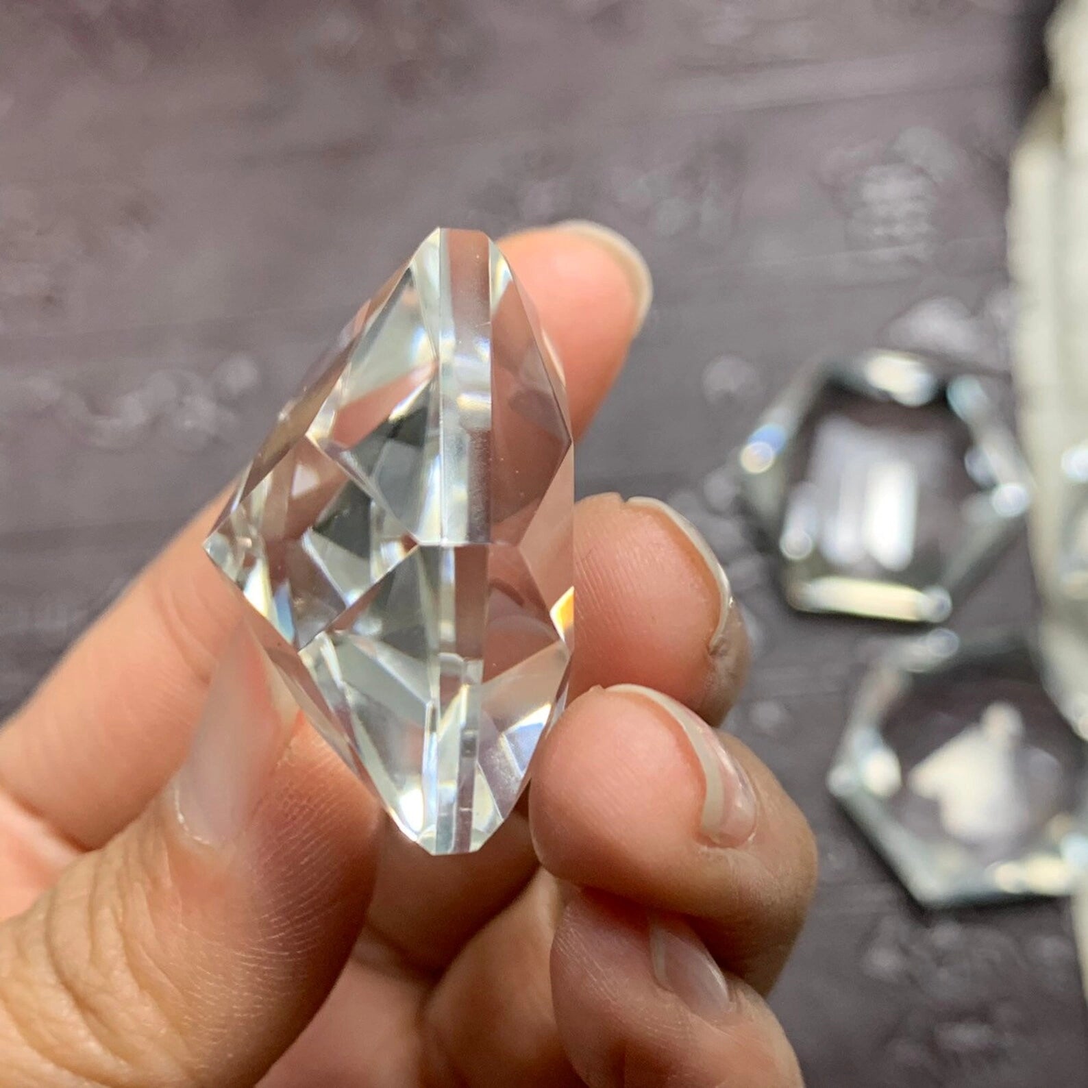 125 carat flawless brazilian clear quartz star cut gemstone, showcasing its brilliant shine - clearquartzshop