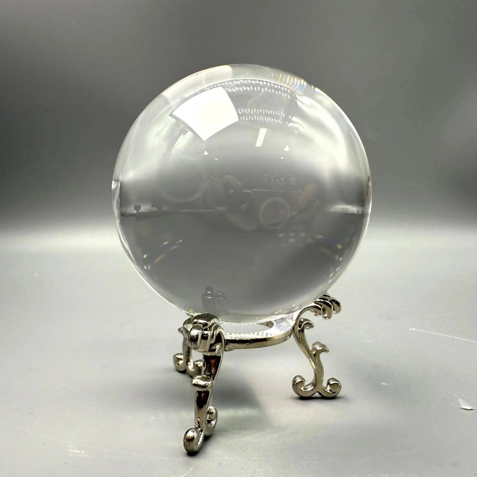 flawless himalayan clear quartz sphere, emphasizing its internal clarity and lack of inclusions - clearquartzshop