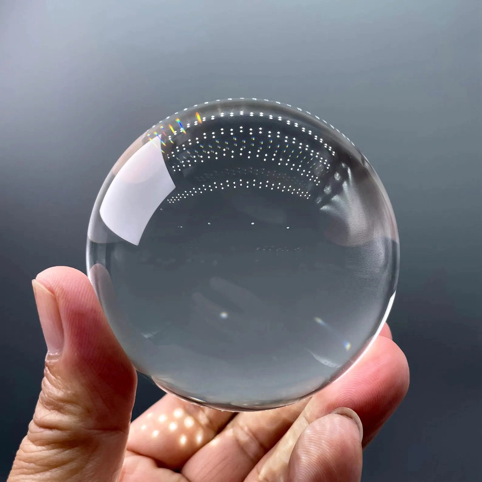 3000 carat flawless himalayan clear quartz crystal sphere, emphasizing its perfect light refraction - clearquartzshop