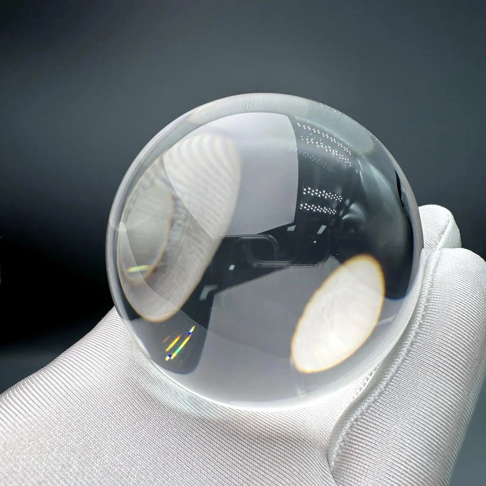 flawless himalayan clear quartz sphere ball, highlighting its smooth finish and light refraction - clearquartzshop