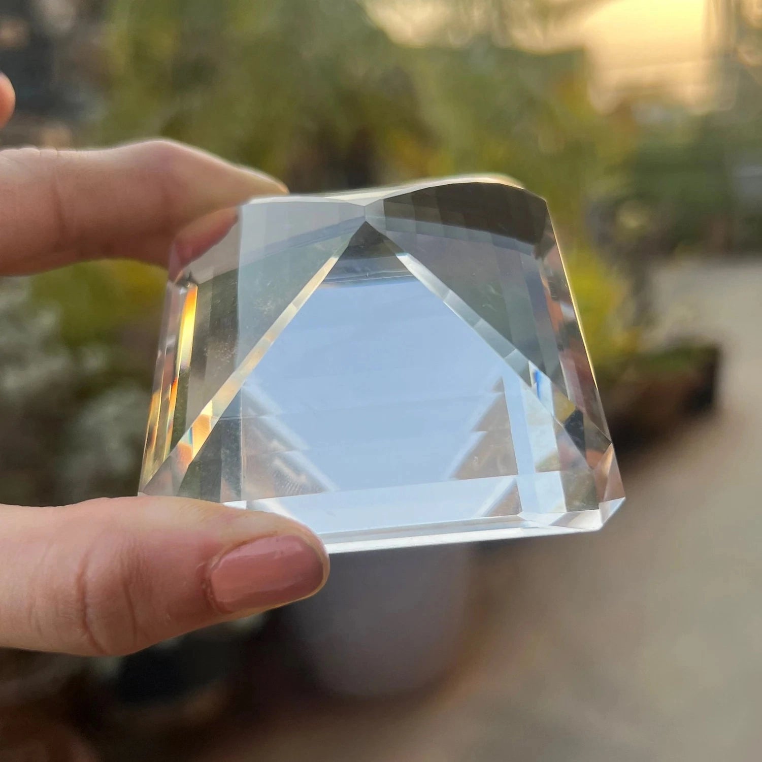 950 carat flawless indian clear quartz multi-faceted gemstone, showing its pristine transparency - clearquartzshop