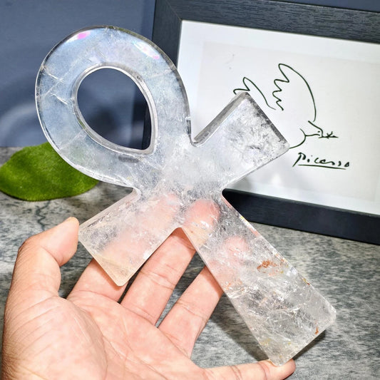 2500 carat large clear quartz ankh cross crystal, hand-carved, held to show scale and clarity - clearquartzshop