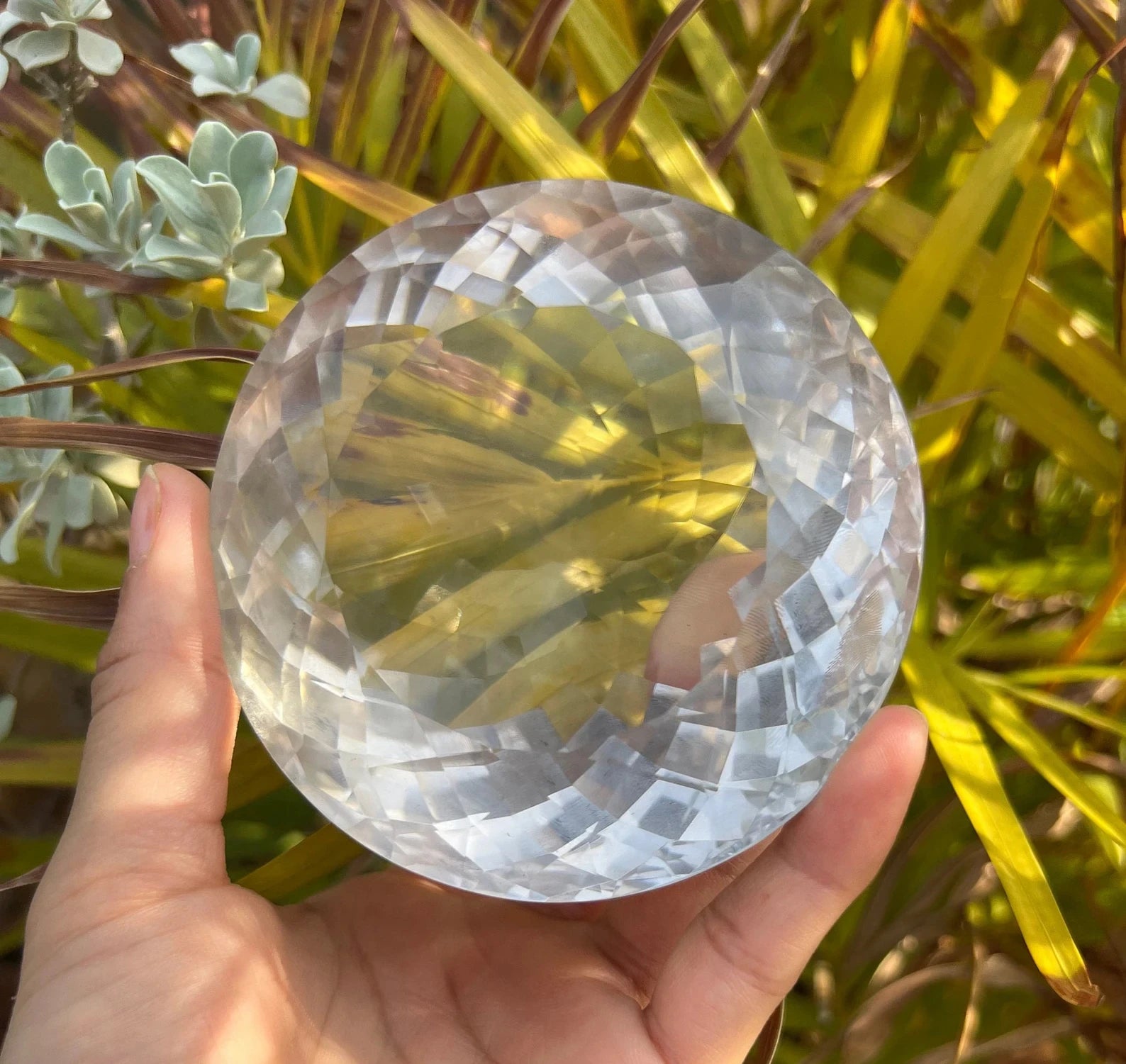 1875 carat flawless large Indian clear quartz spherical faceted gemstone, highlighting its intricate facets - clearquartzshop