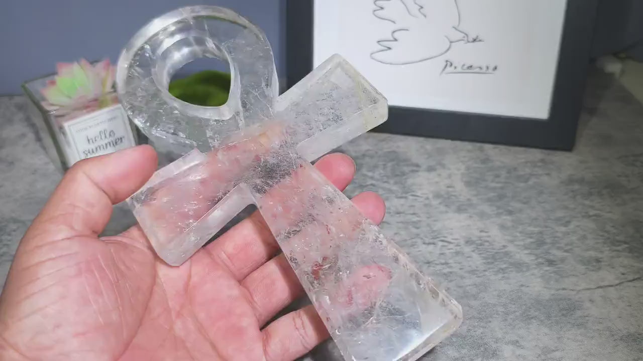 2500ct clear quartz ankh cross crystal, highlighting its carving details and translucency - clearquartzshop
