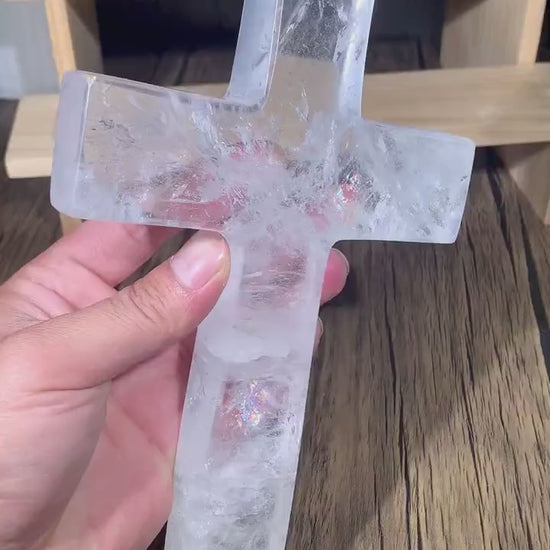 observe the natural clarity and spiritual presence of the clear quartz large healing crystal cross - clearquartzshop