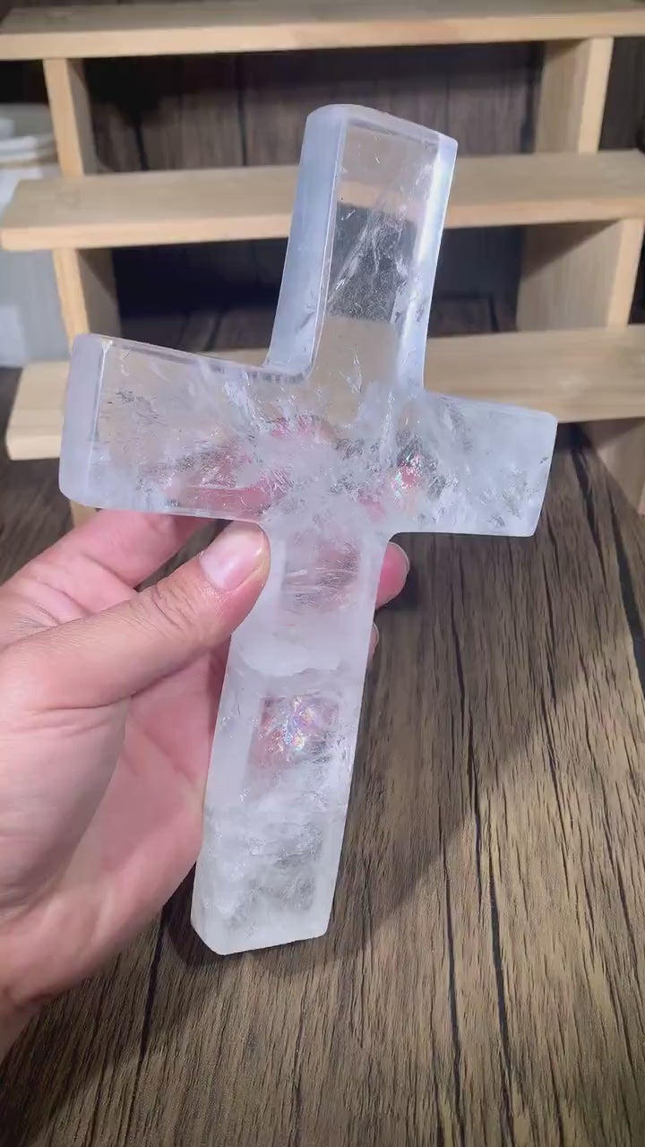 observe the natural clarity and spiritual presence of the clear quartz large healing crystal cross - clearquartzshop