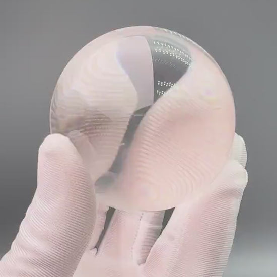 flawless himalayan clear quartz sphere, showing its pure transparency and reflective qualities from tibet - clearquartzshop