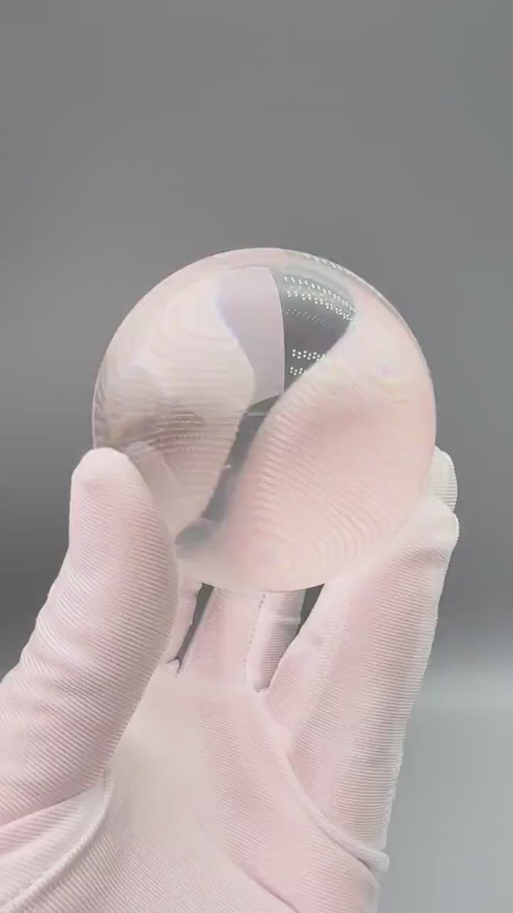 flawless himalayan clear quartz sphere, showing its pure transparency and reflective qualities from tibet - clearquartzshop