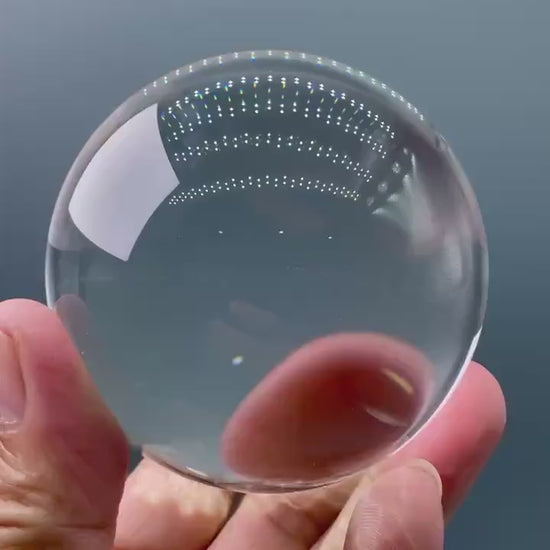 3000 carat flawless himalayan clear quartz sphere, highlighting its internal brilliance and perfect form - clearquartzshop