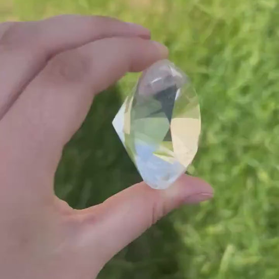 watch the 400 carat brilliant clear quartz round faceted gemstone's flawless clarity in motion - clearquartzshop