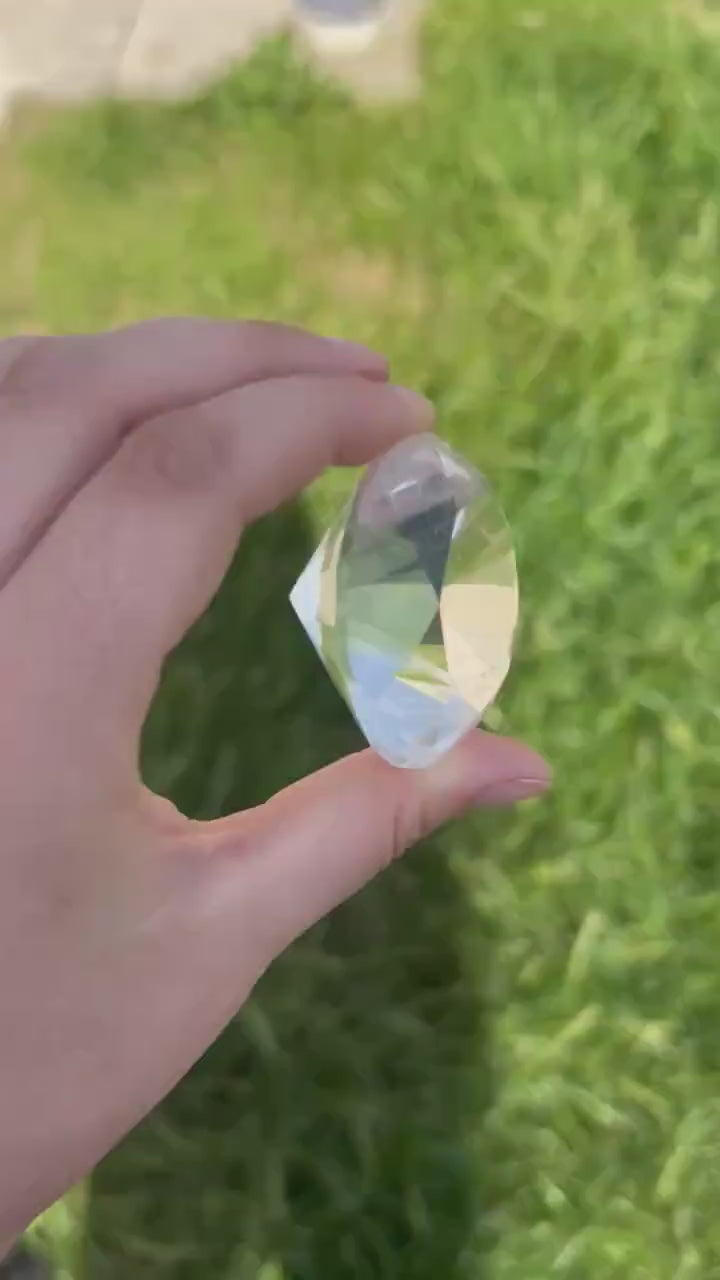 watch the 400 carat brilliant clear quartz round faceted gemstone's flawless clarity in motion - clearquartzshop