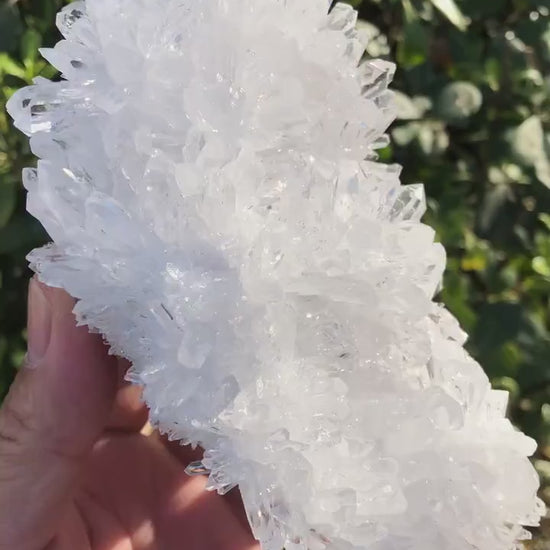 video of 725g chinese clear quartz cluster sparkling in sunlight - clearquartzshop