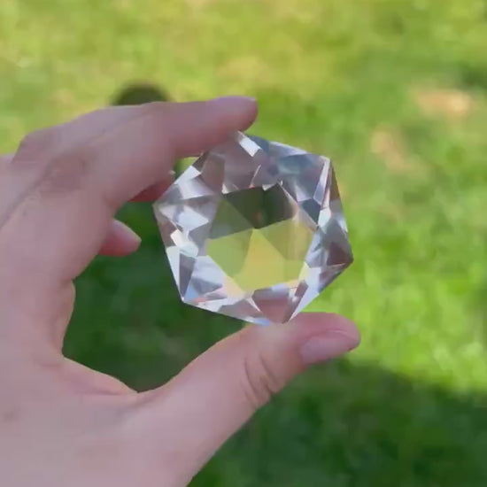 watch the 375 carat brazilian clear quartz multi-faceted gemstone's dazzling light refraction - clearquartzshop