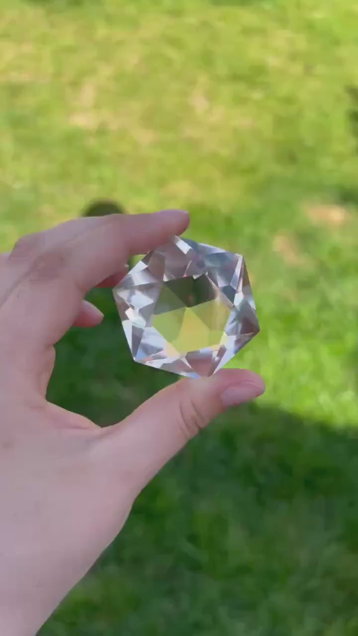 watch the 375 carat brazilian clear quartz multi-faceted gemstone's dazzling light refraction - clearquartzshop
